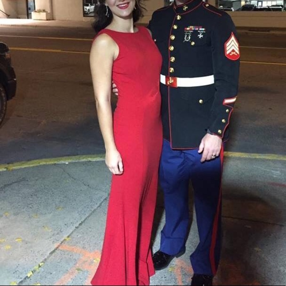 Backless Red body fitted prom/formal dress.